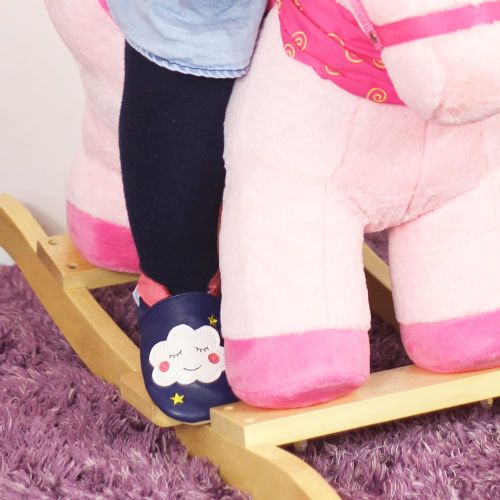 Little girl wearing soft sole baby shoes with cloud motif by Dotty Fish 