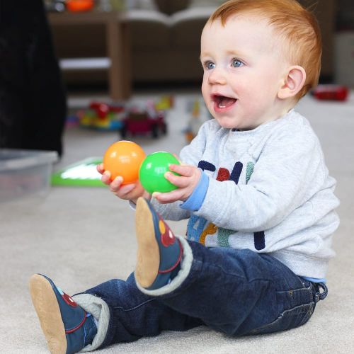 Baby wearing navy blue soft leather baby shoes with red car design from Dotty Fish 