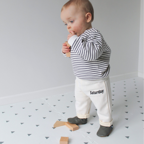 First steps while wearing grey leather baby shoes with non-slip soles from Dotty Fish 