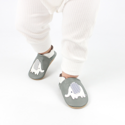 Toddler walking while wearing Dotty Fish Nya the Elephant soft sole baby shoes