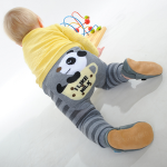 Knitted baby leggings with cute panda design on the nappy area