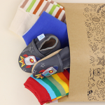 Dotty Fish shoes and accessories delivered in a sustainable paper mailing bag